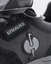 Close-up of the Canberra Steel Toe Work Shoe STRAUSS logo