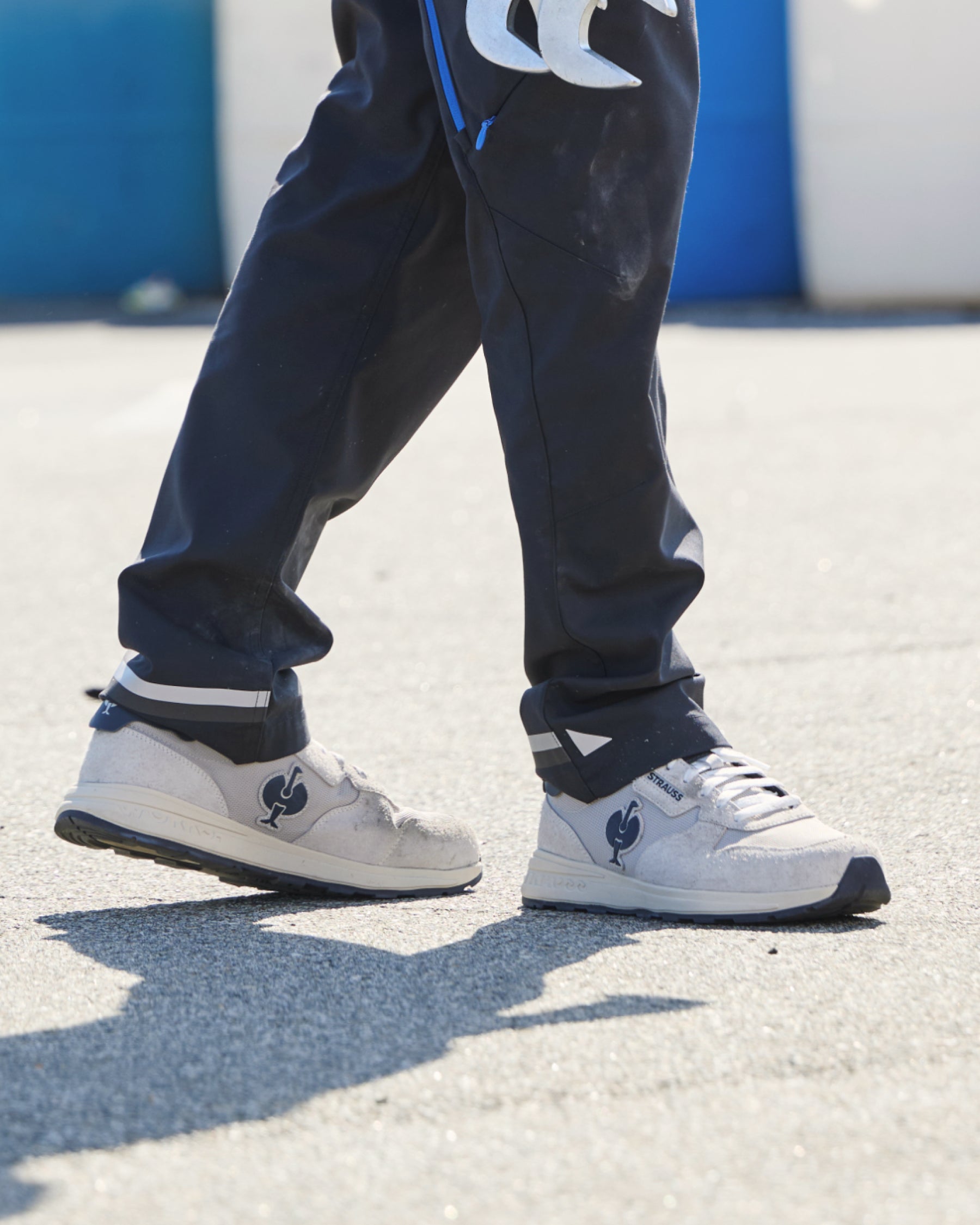 STRAUSS Canberra Steel Toe Work Shoe in Silver shown on rough jobsite ground