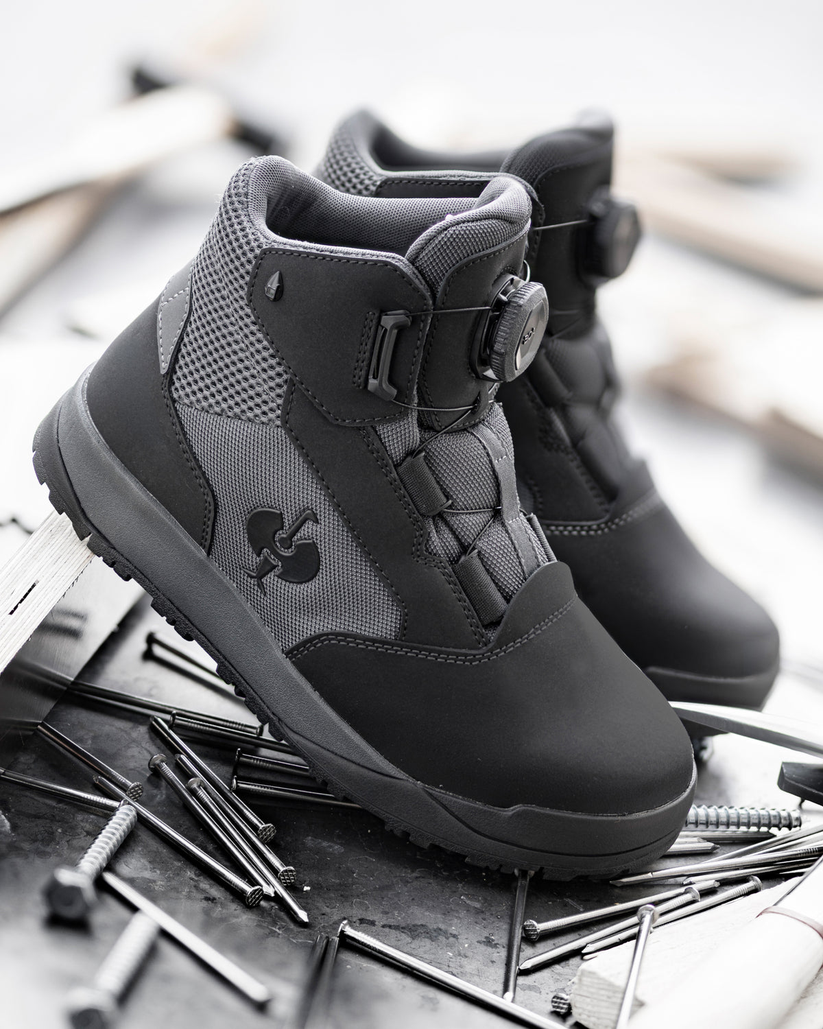 STRAUSS Murcia 6-inch Steel Toe Work Boot in Carbon gray and Black shown in use on the job