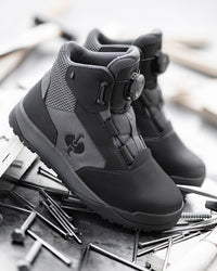STRAUSS Murcia 6-inch Steel Toe Work Boot in Carbon gray and Black shown in use on the job