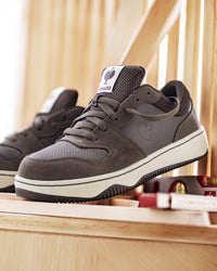 STRAUSS Eindhoven Steel Toe Work Shoe in Chestnut with workwear in a jobsite scene
