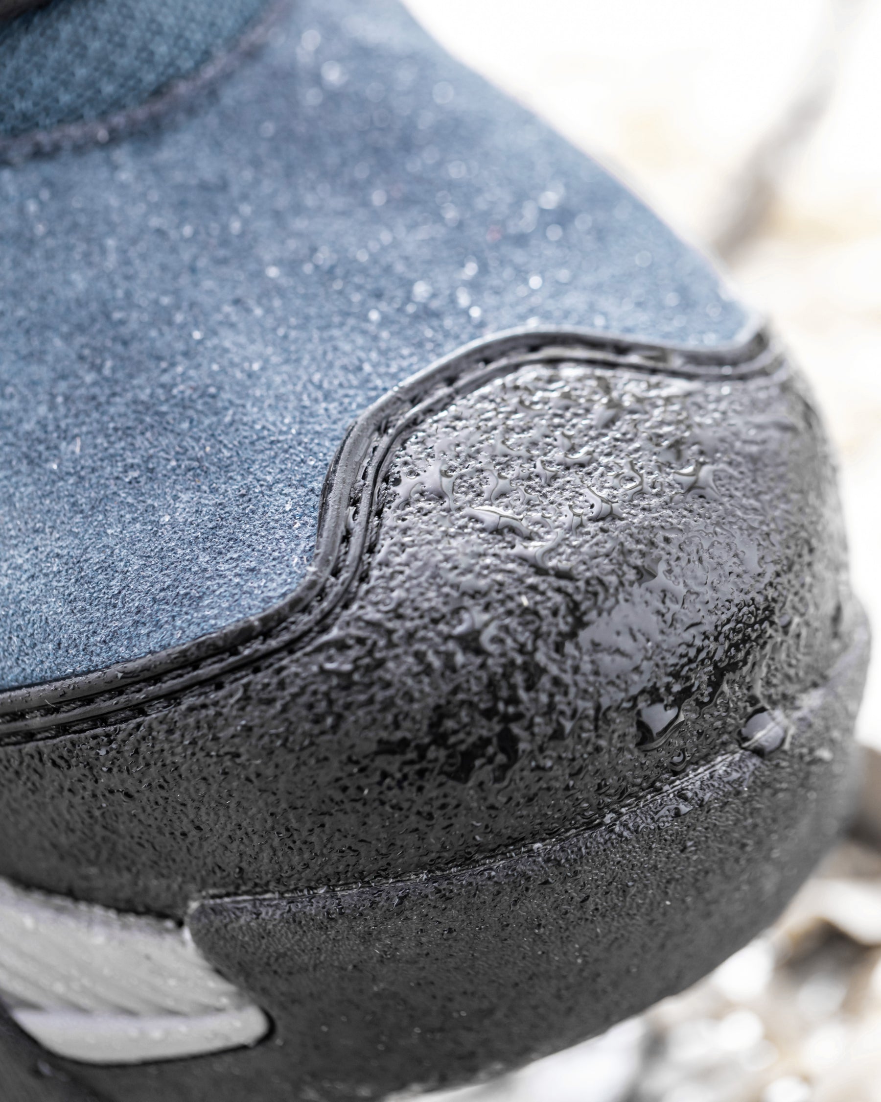 STRAUSS Turin 6-inch Aluminum Toe Work Boot in Oxid blue shown in use on the job