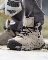 STRAUSS Turin 6-inch Aluminum Toe Work Boot in Dolphin gray shown on rough jobsite ground