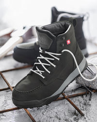 STRAUSS Omaha 6-inch Steel Toe Work Boot in Black with workwear in a jobsite scene