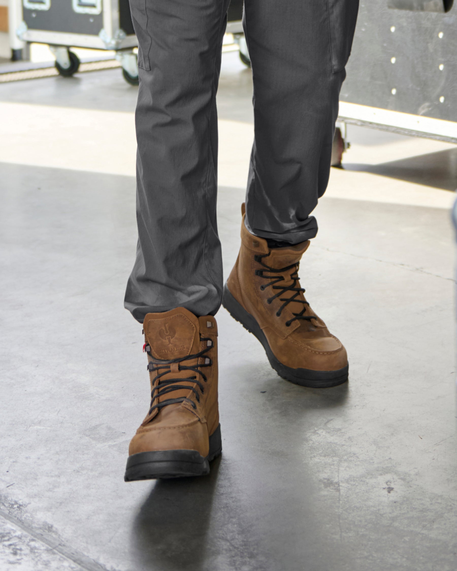 STRAUSS Omaha 6-inch Steel Toe Work Boot in Carob brown with workwear in a jobsite scene