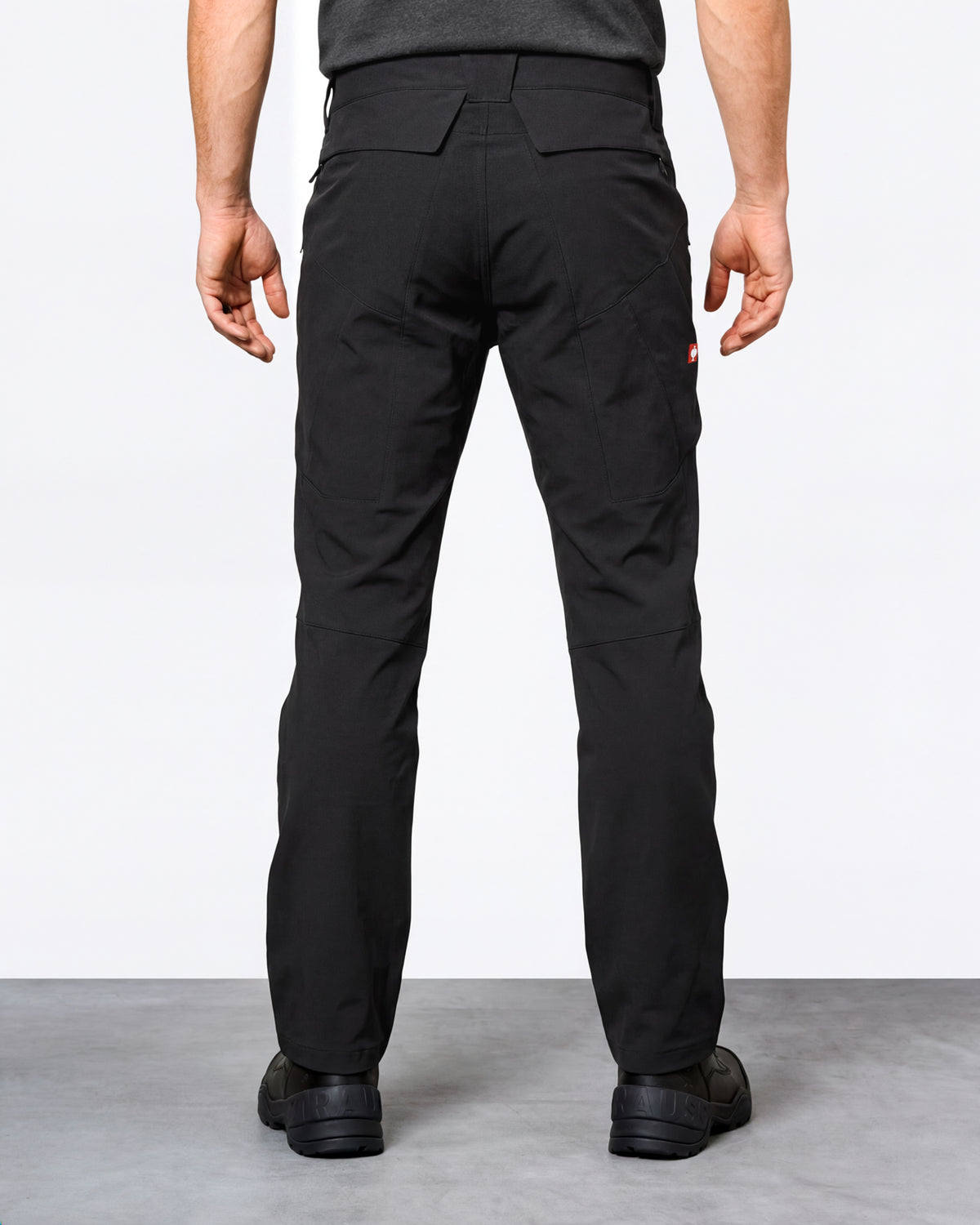 Utility Cargo Work Pants in black worn by a model, rear view