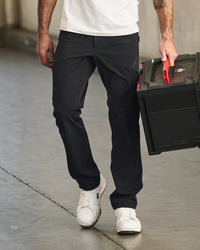 Utility Cargo Work Pants in black worn in a work setting