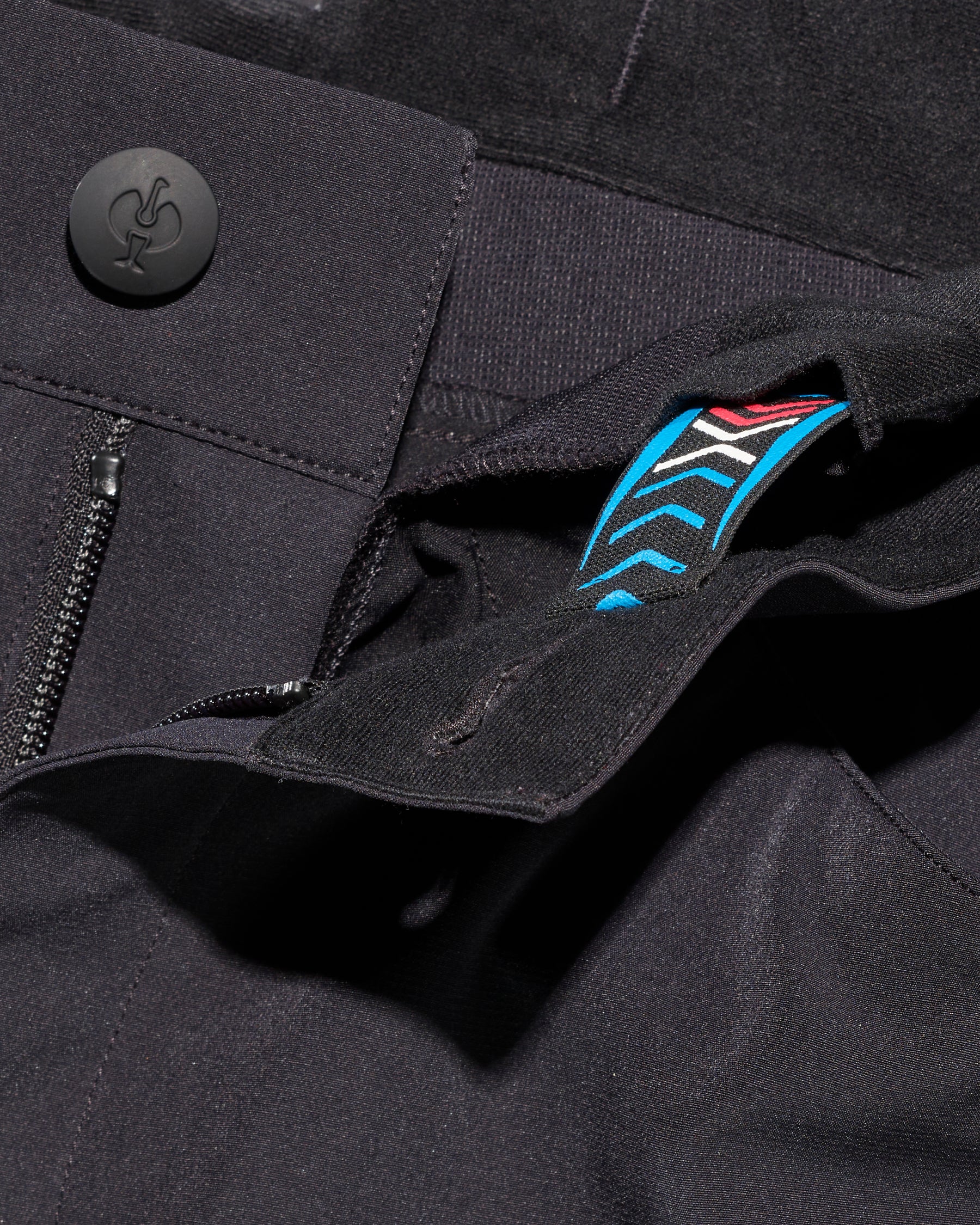 Close-up of waistband details on Utility Cargo Work Pants in black