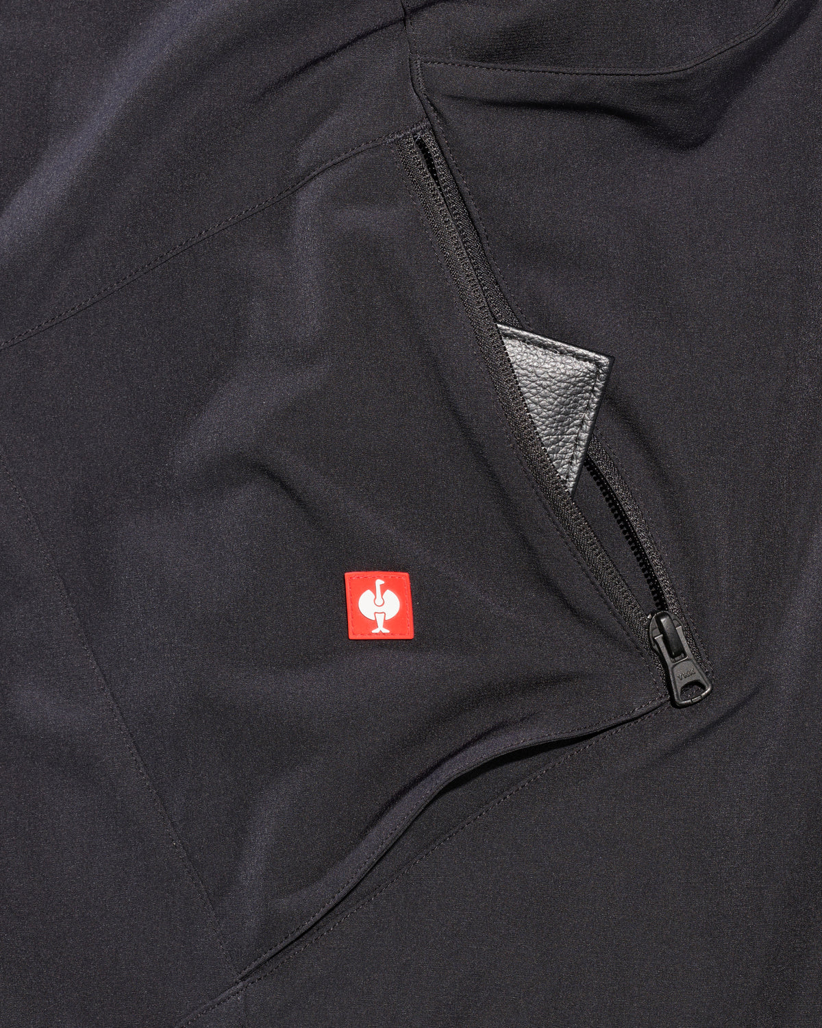 Close-up of reinforced fabric and seams on Utility Cargo Work Pants in black