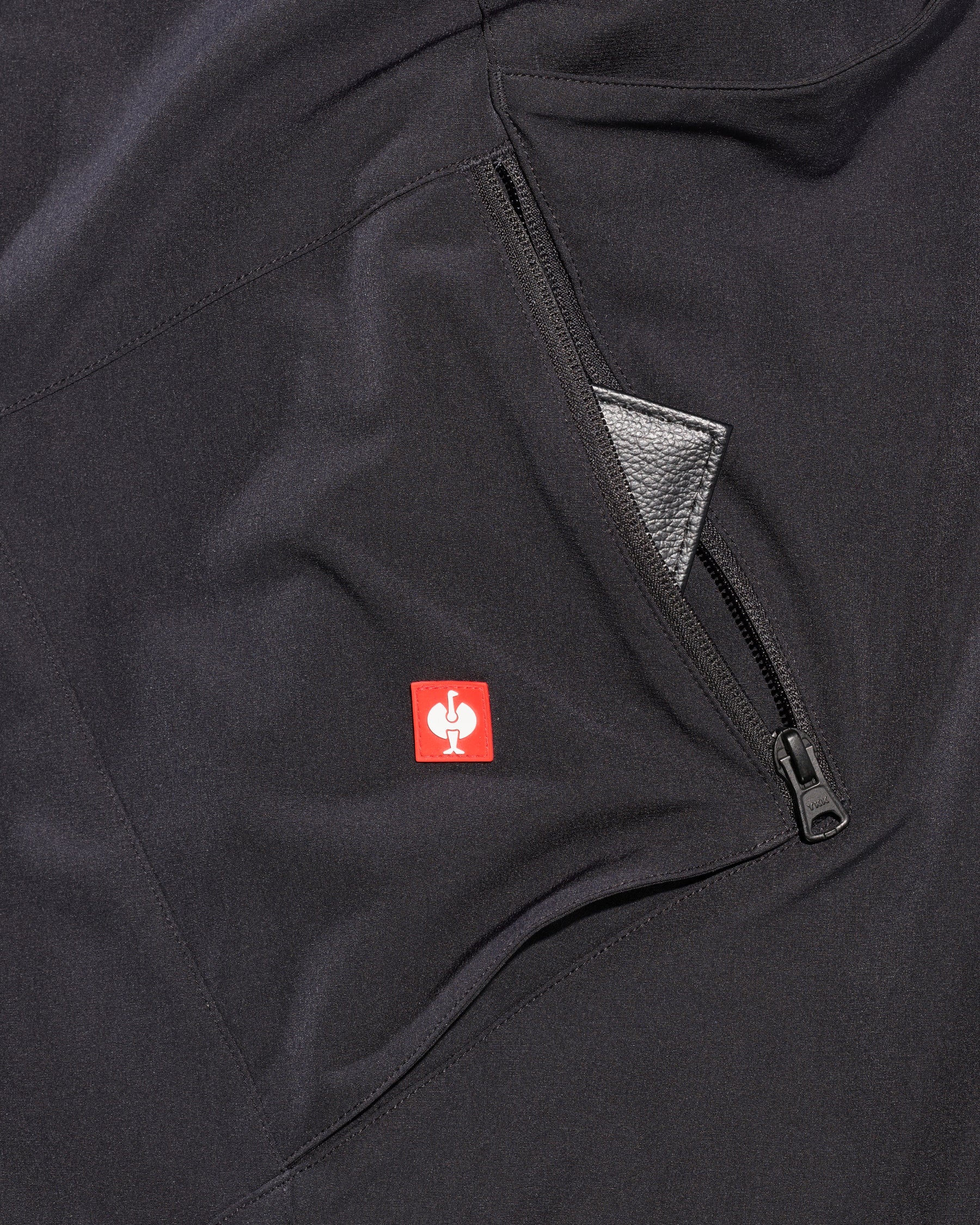 Close-up of reinforced fabric and seams on Utility Cargo Work Pants in black