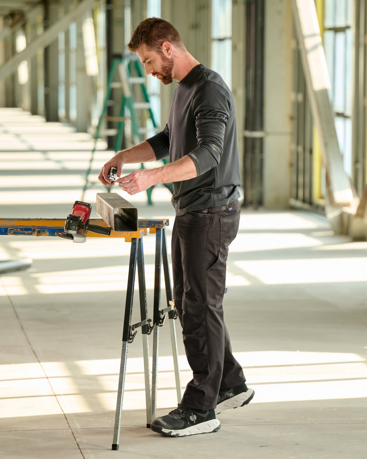 Lifestyle view of STRAUSS 1620 Worker Pants in moon gray during work