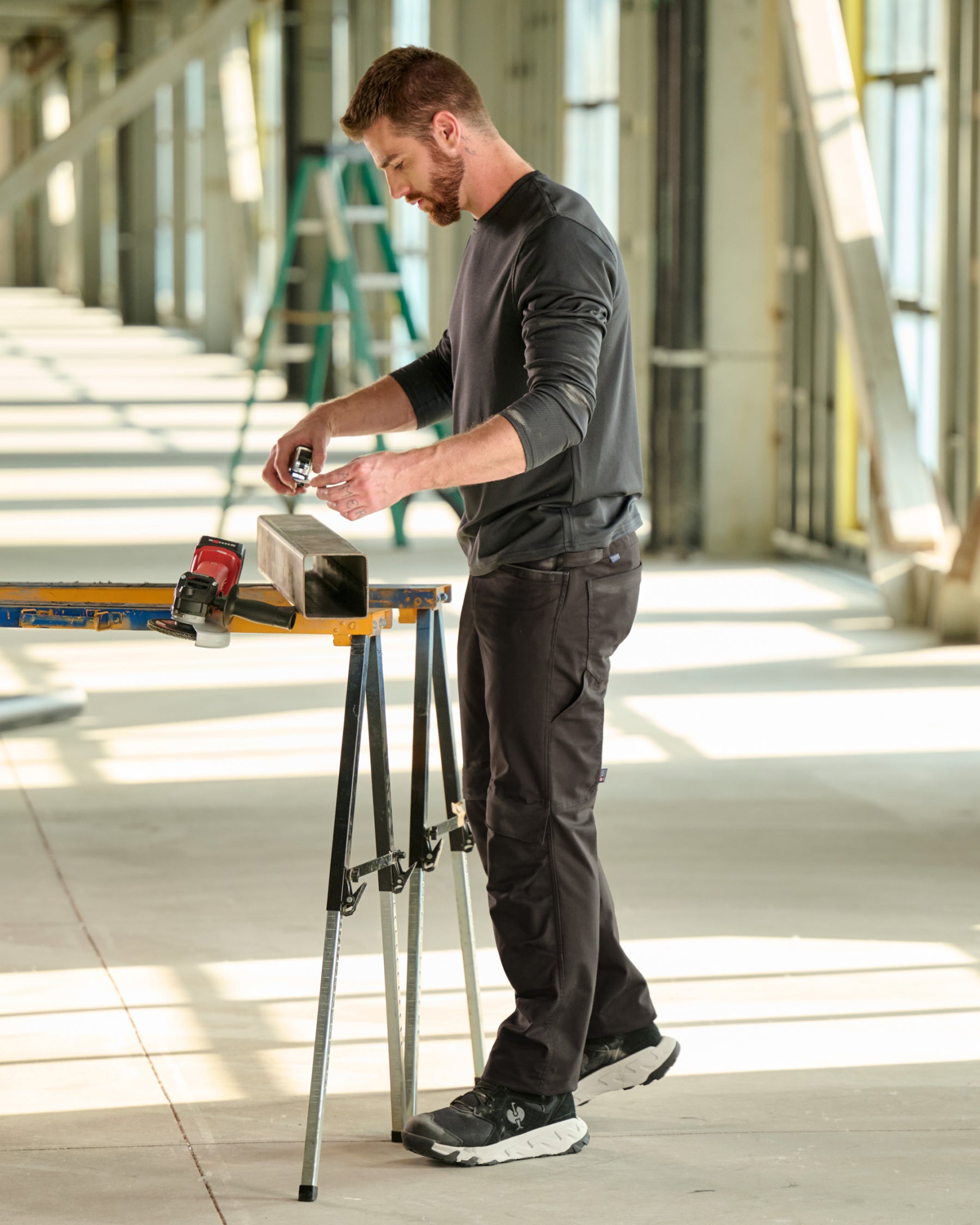 Lifestyle view of STRAUSS 1620 Worker Pants in moon gray during work