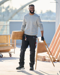 STRAUSS 1620 Worker Pants in meteorite shown in an outdoor workwear setting