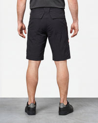 Alternate model view of Engelbert Strauss utility cargo work shorts in black, showing the side and back fit with visible utility pocket placement and workwear construction.