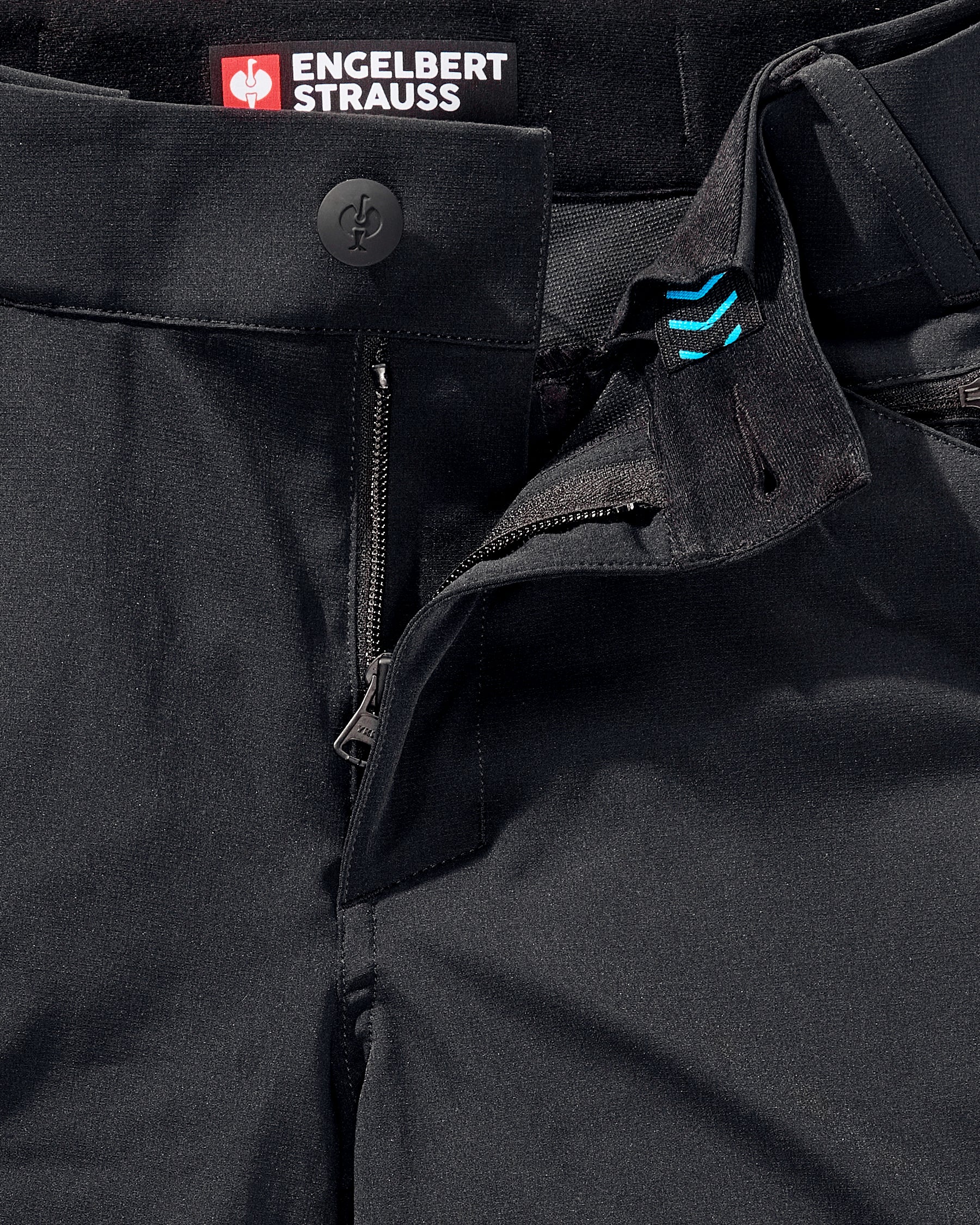 Additional close-up detail of Engelbert Strauss utility cargo work shorts in black, showing fabric texture, stitching, and functional finishing details.