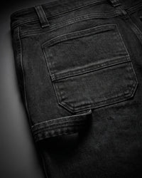 Close-up of denim pocket and stitching on Carpenter Jeans e.s.iconic in black