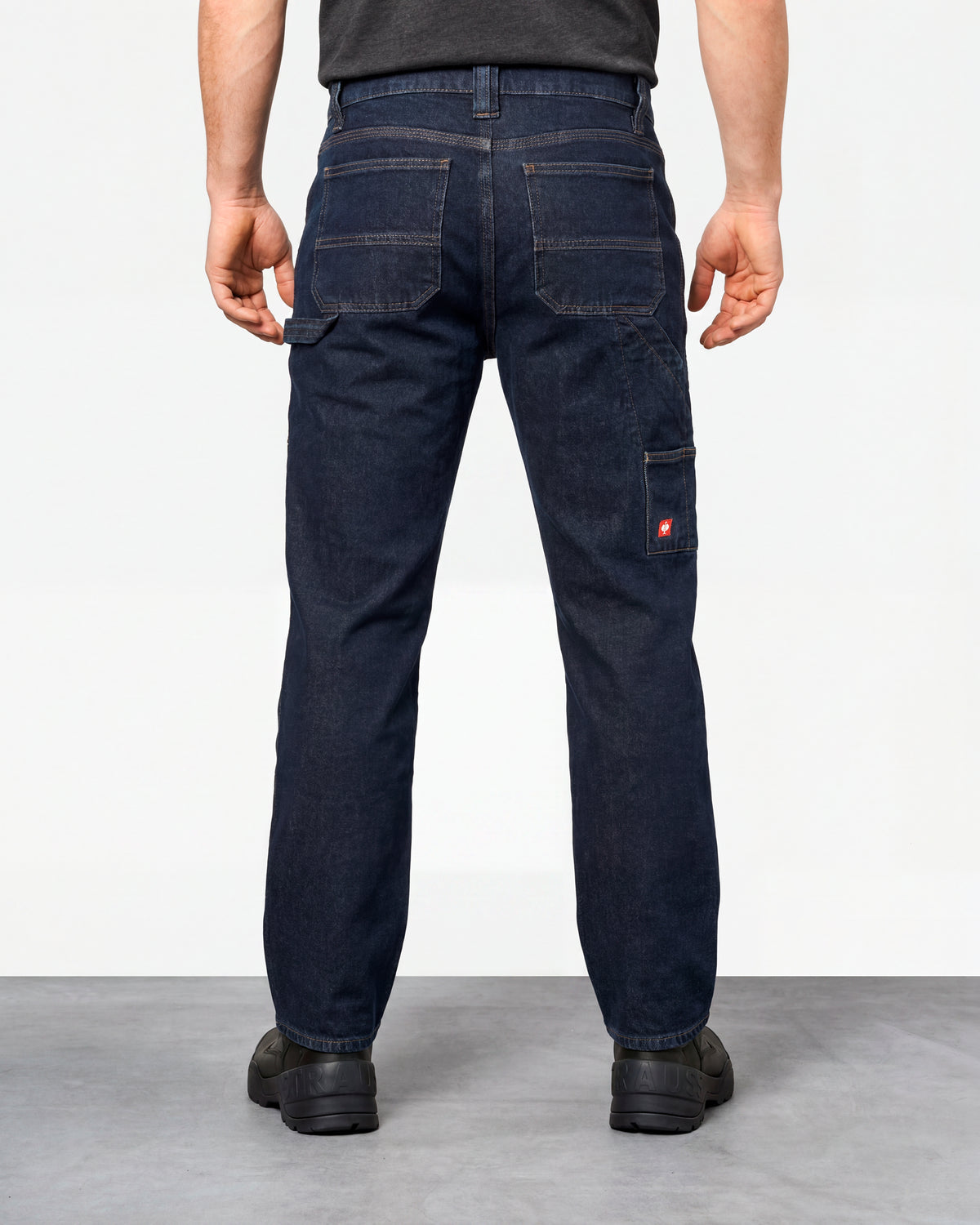 Carpenter Jeans e.s.iconic in dark wash worn by a model, rear view