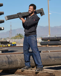 Lifestyle view of Carpenter Jeans e.s.iconic in dark wash during work