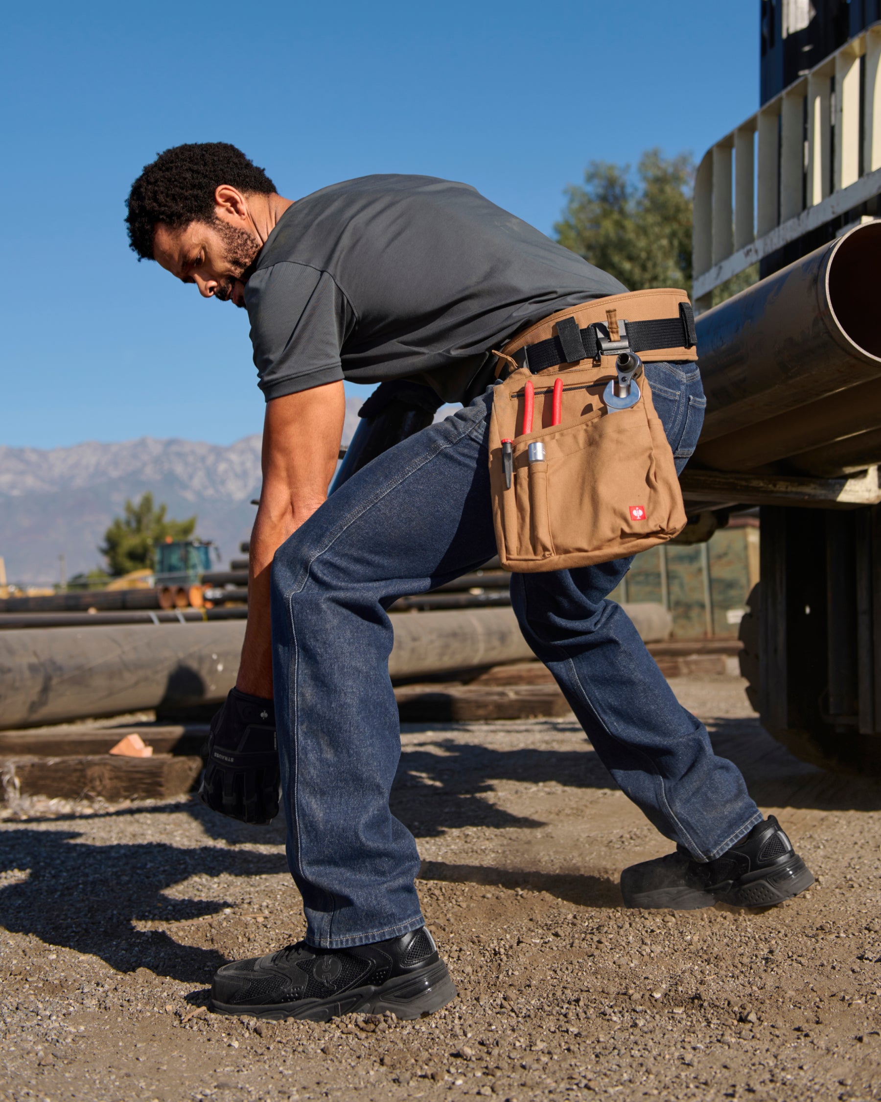 Carpenter Jeans e.s.iconic in dark wash shown in an outdoor workwear setting