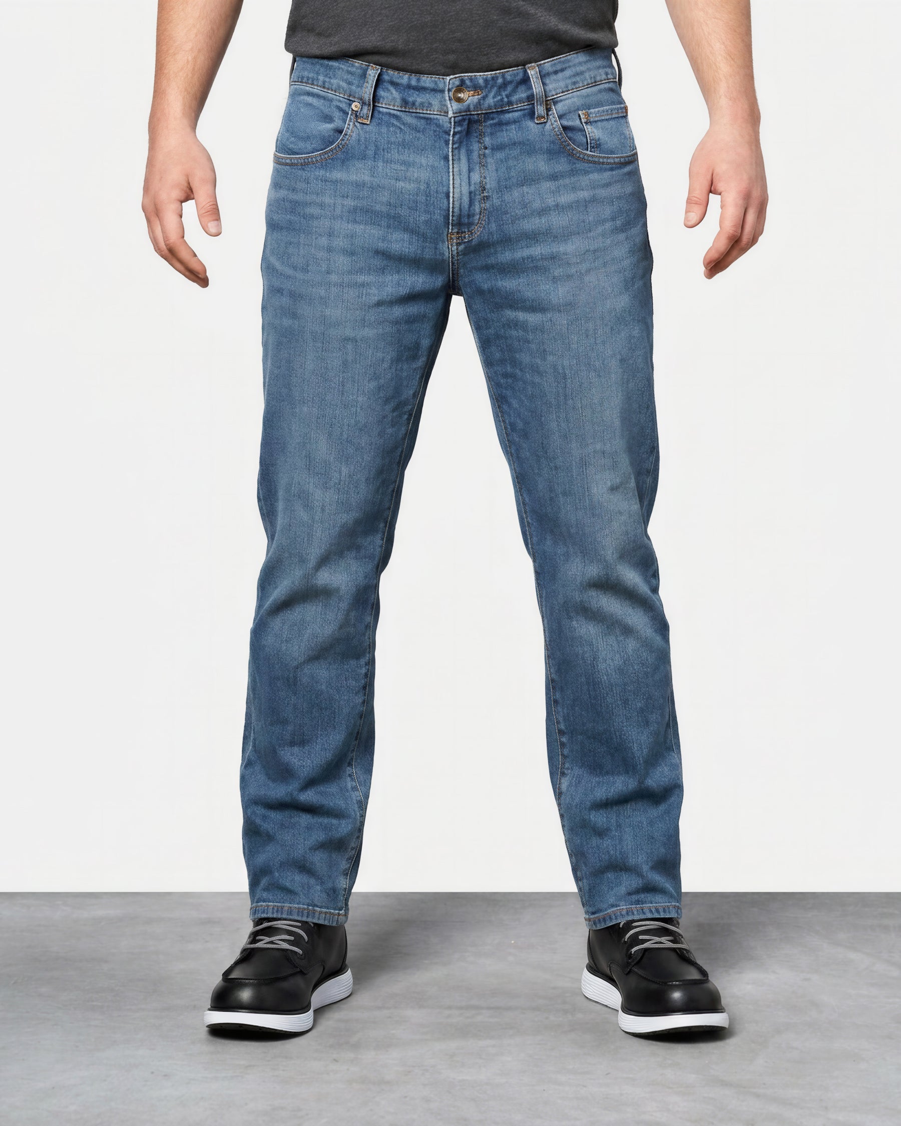 Power Denim 5-Pocket Jeans in stonewashed worn by a model, front view