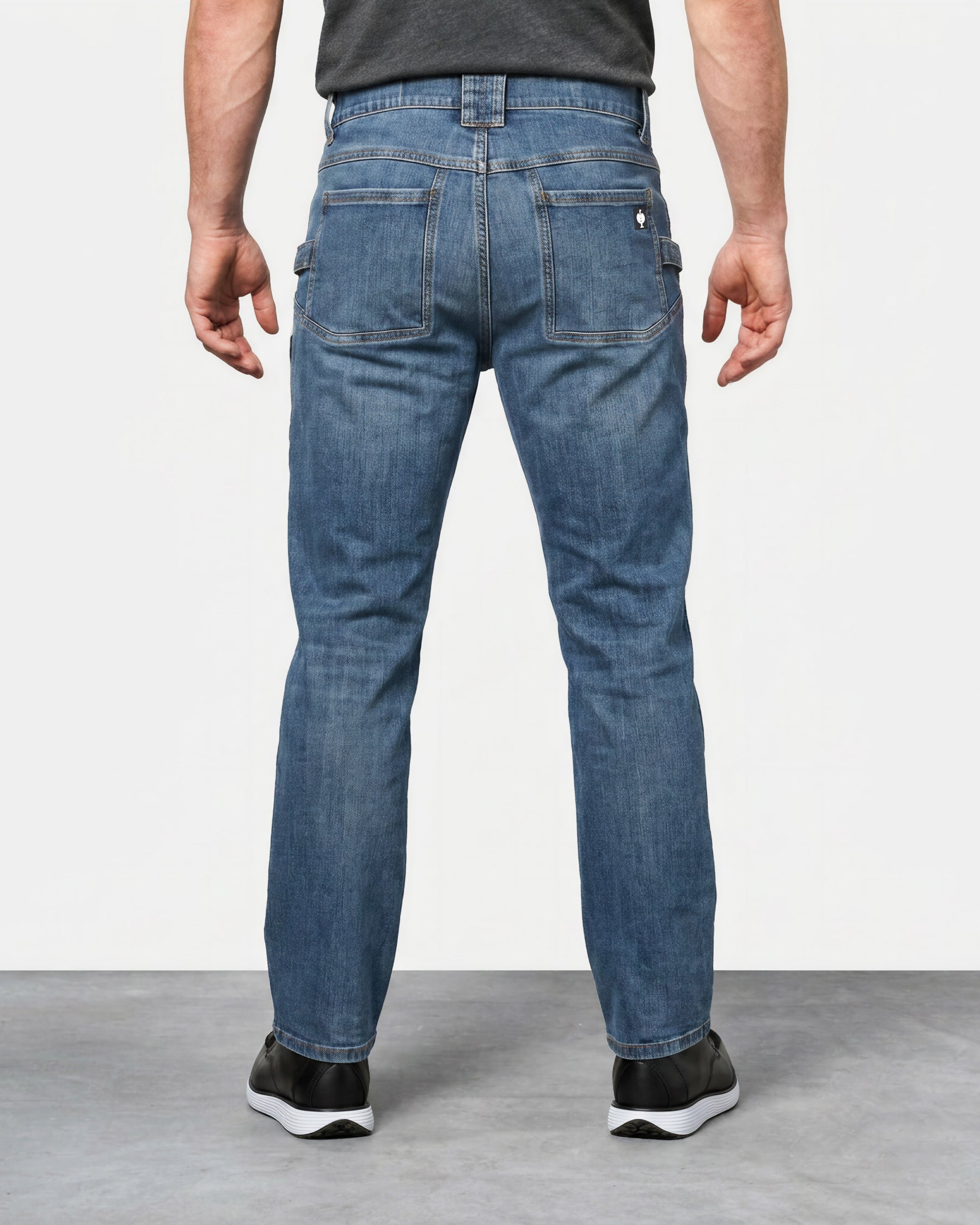 Power Denim 5-Pocket Jeans in stonewashed worn by a model, rear view
