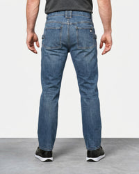 Power Denim 5-Pocket Jeans in stonewashed worn by a model, rear view