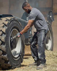 Power Denim 5-Pocket Jeans in blackwashed in use, showing fit and movement