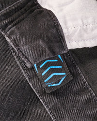 Close-up of waistband and stitching on Power Denim 5-Pocket Jeans in blackwashed