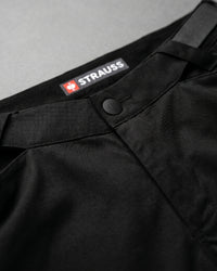Additional close-up detail of Engelbert Strauss e.s. trail pure cargo work shorts in black and carbon gray, showing fabric texture, stitching, and functional finishing details.