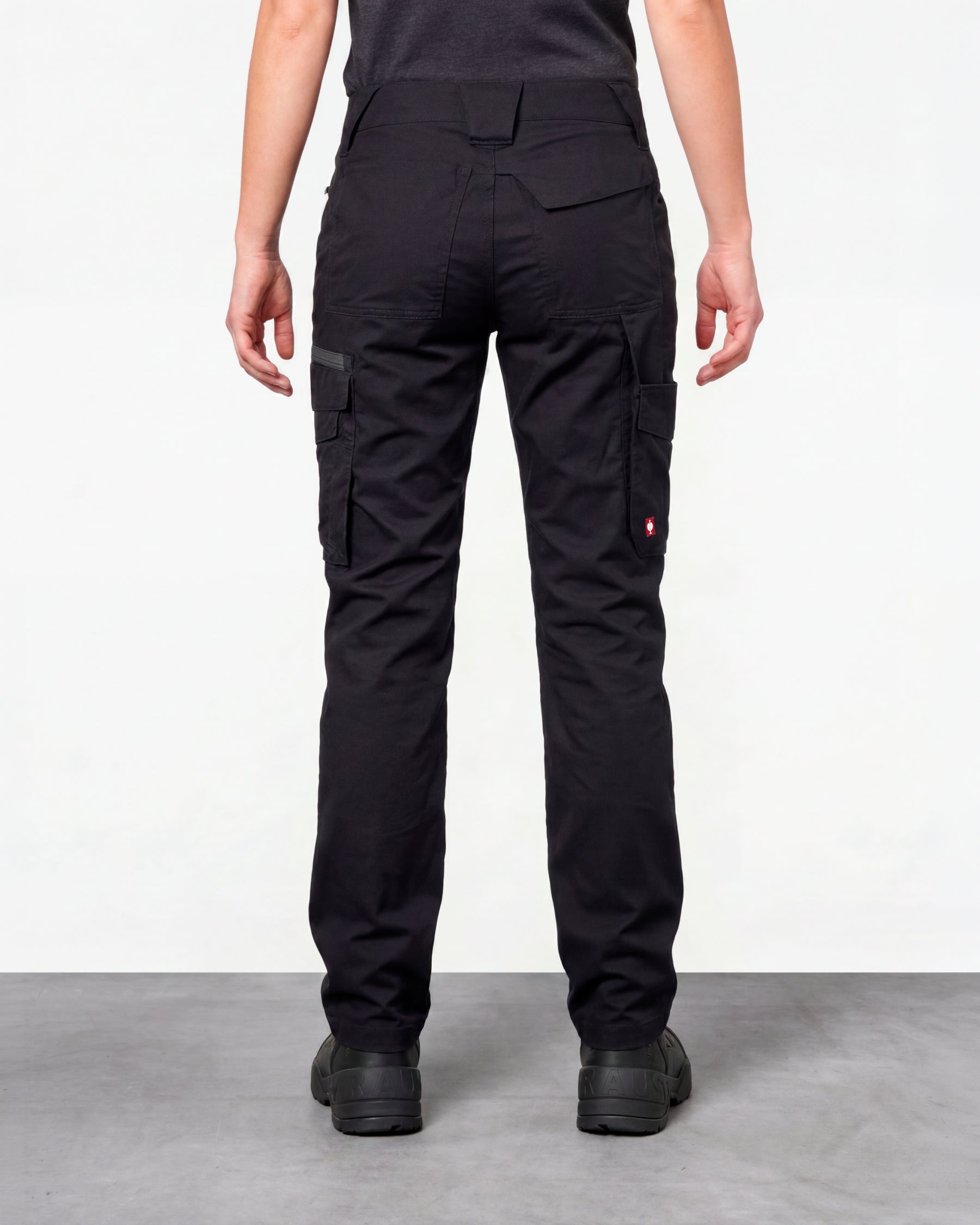 Women's Cargo Work Pants e.s.trail pure in black/carbon gray worn by a model, rear view