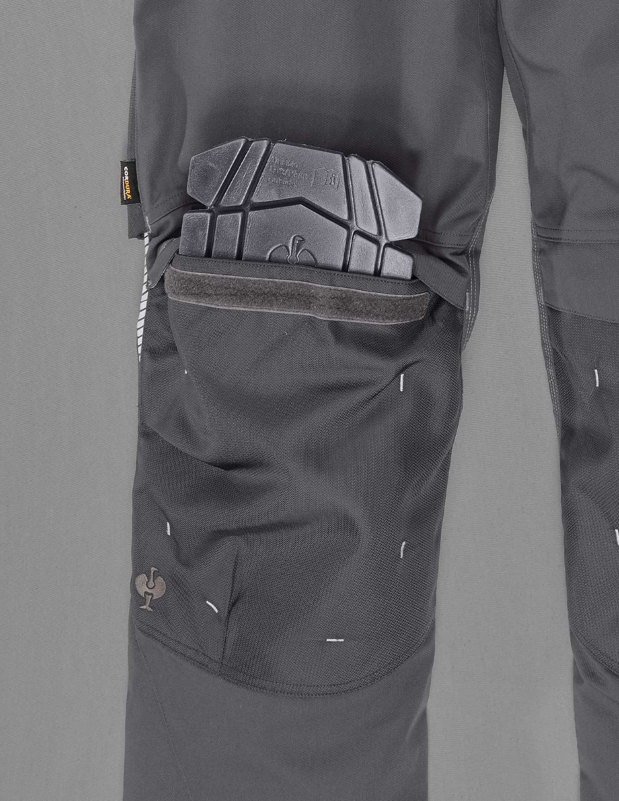 Close up of a knee pad pocket with an knee pad inside