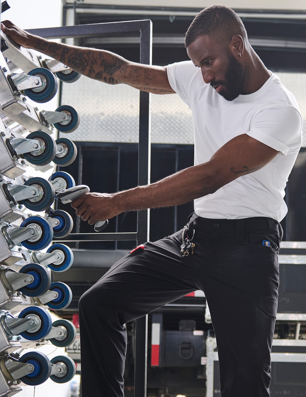 Man adjusting equipment.