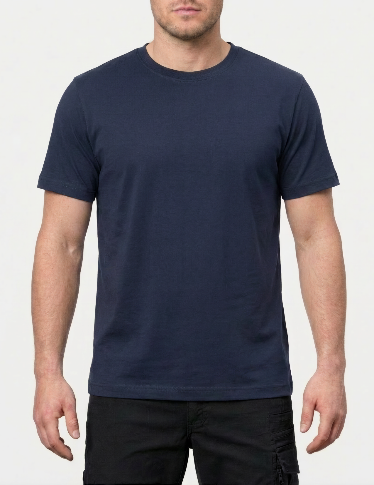 Man wearing a navy t-shirt on a white background