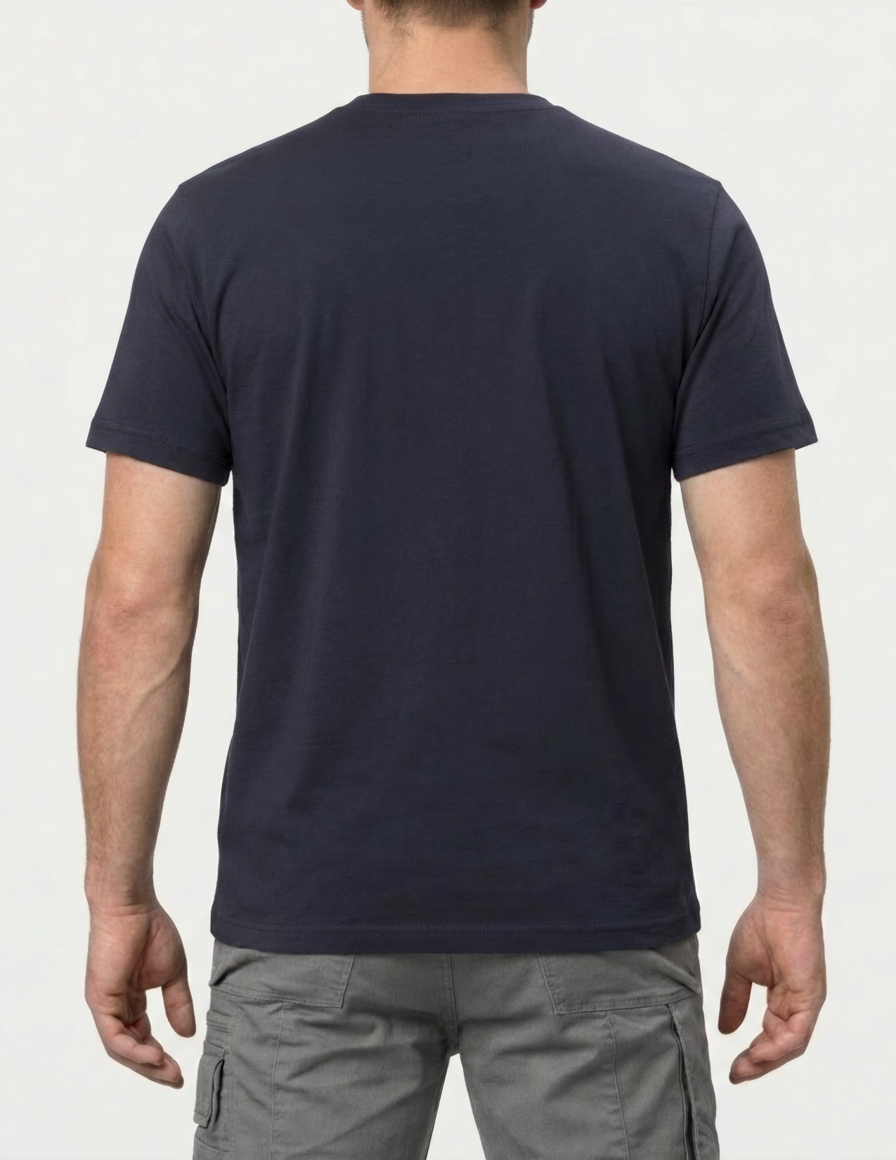 Person wearing a navy blue t-shirt on a white background