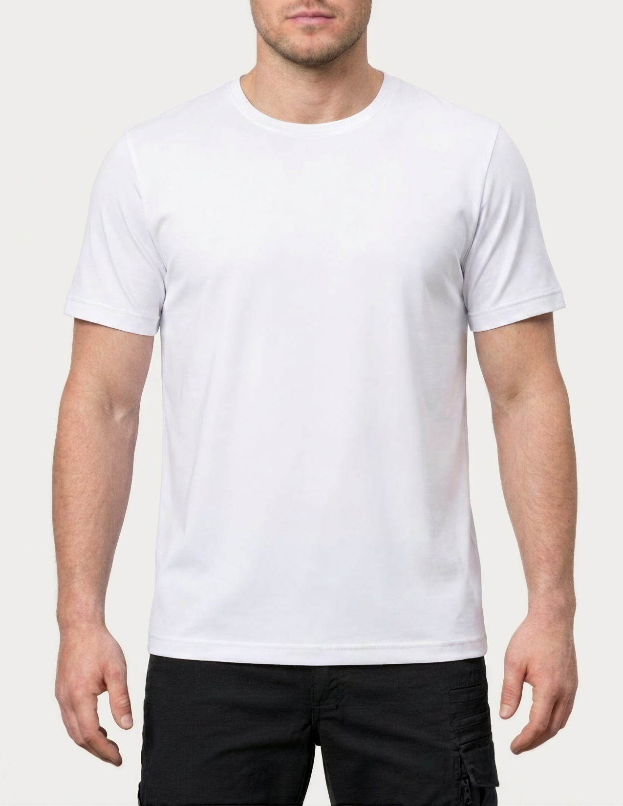 Person wearing a plain white t-shirt on a white background