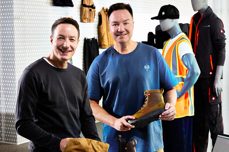 Steffen and Henning Strauss stand with new product