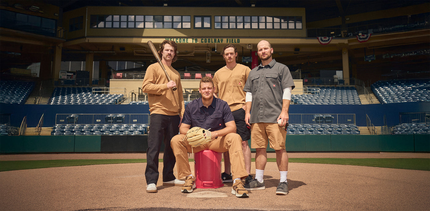 Team sits on home plate