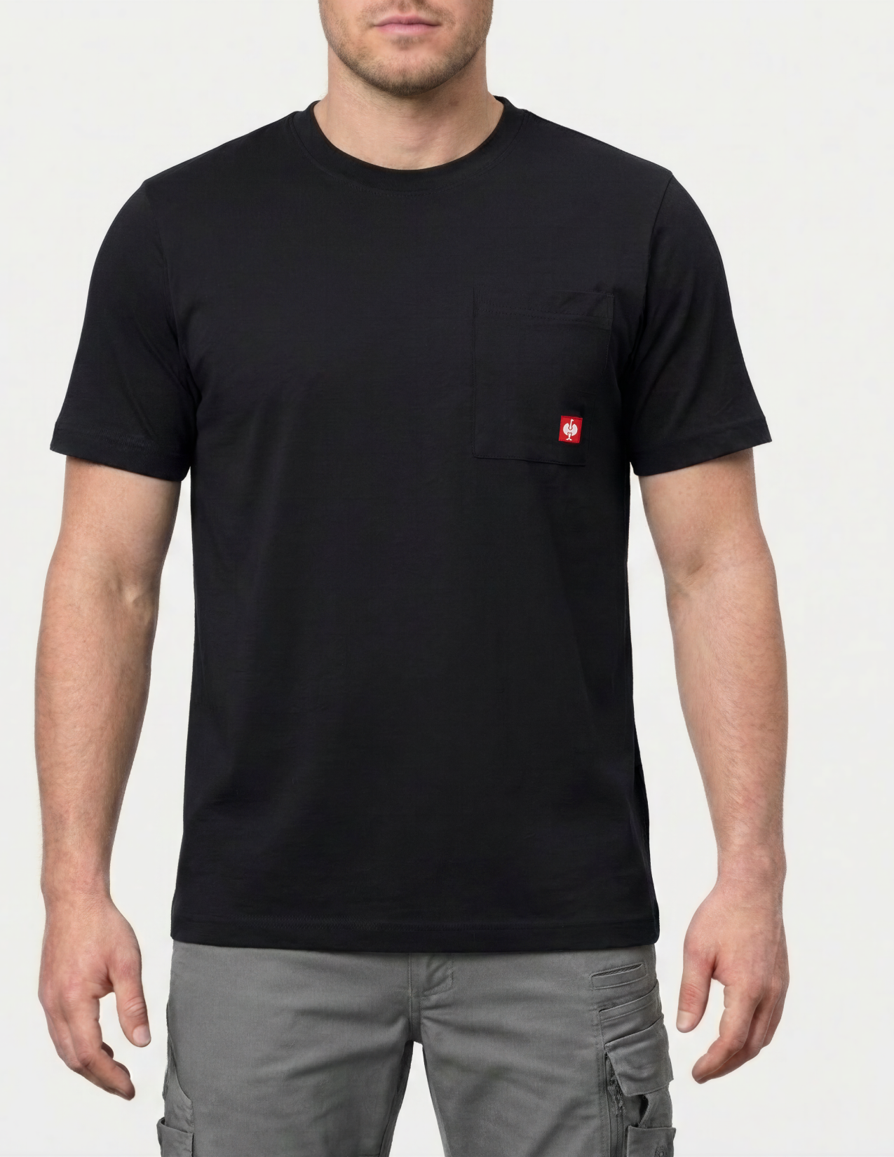 Person wearing a black t-shirt with a red logo on a white background