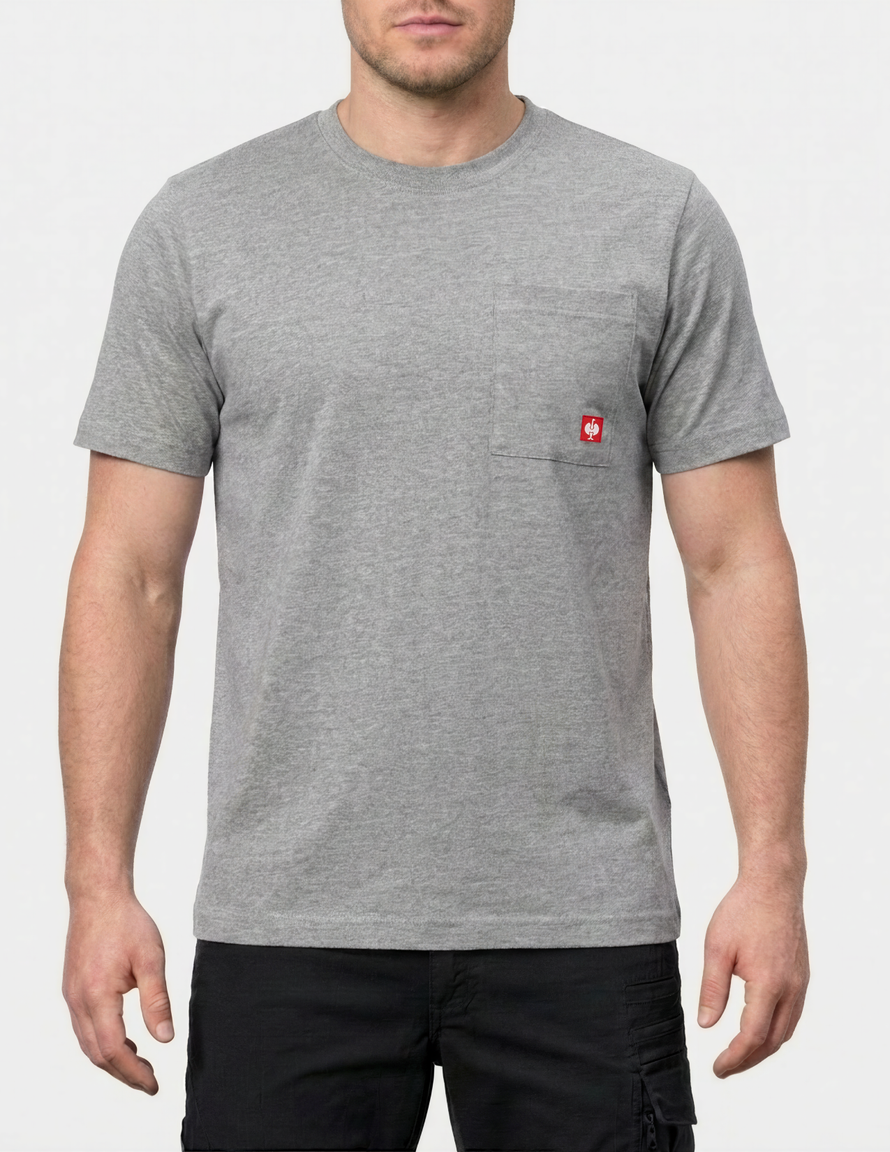 Man wearing a gray t-shirt with a red logo on a white background