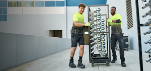 Two men wearing high-vis workwear