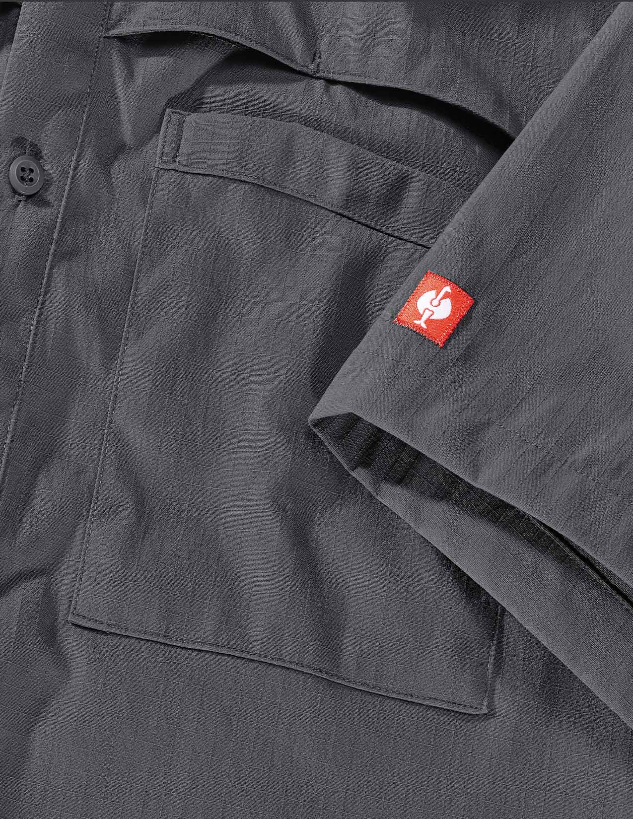 Close up of chest pocket and sleeve