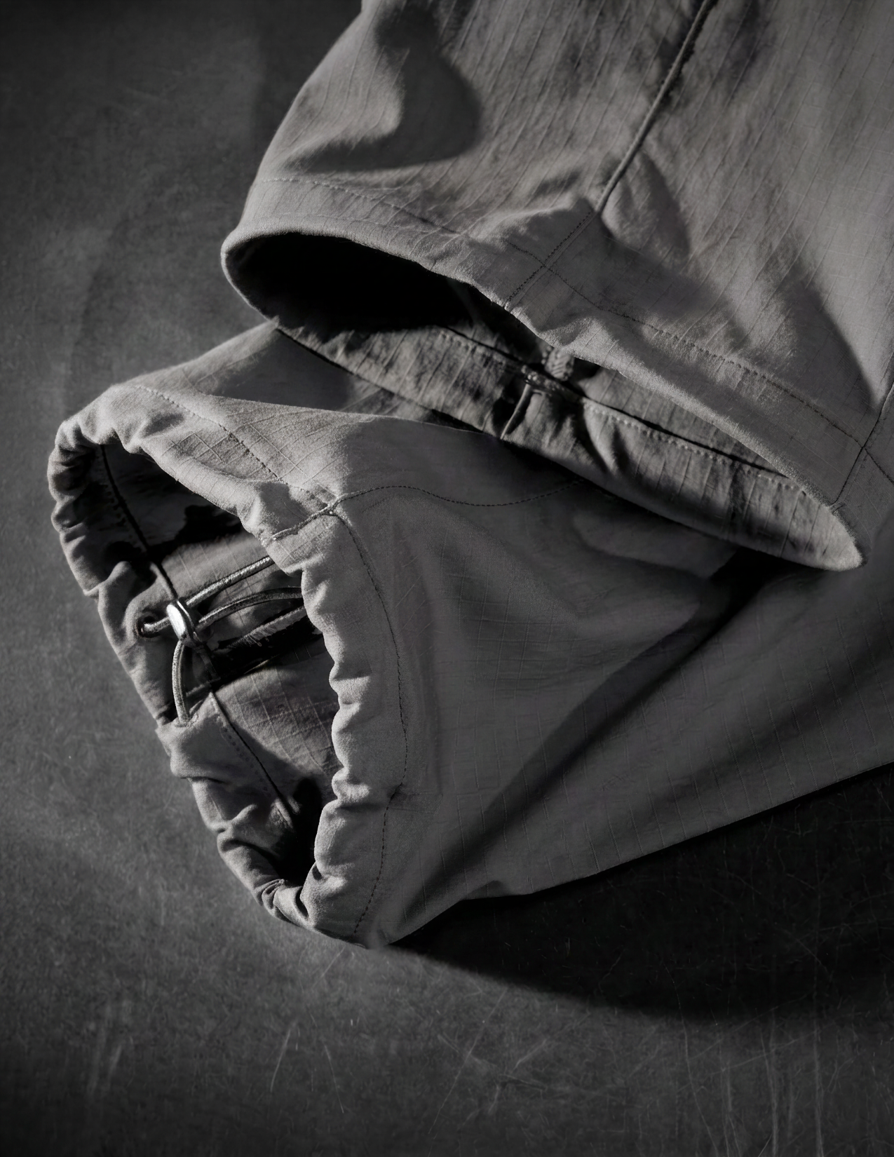 close-up of adjustable hem with drawstring and stopper