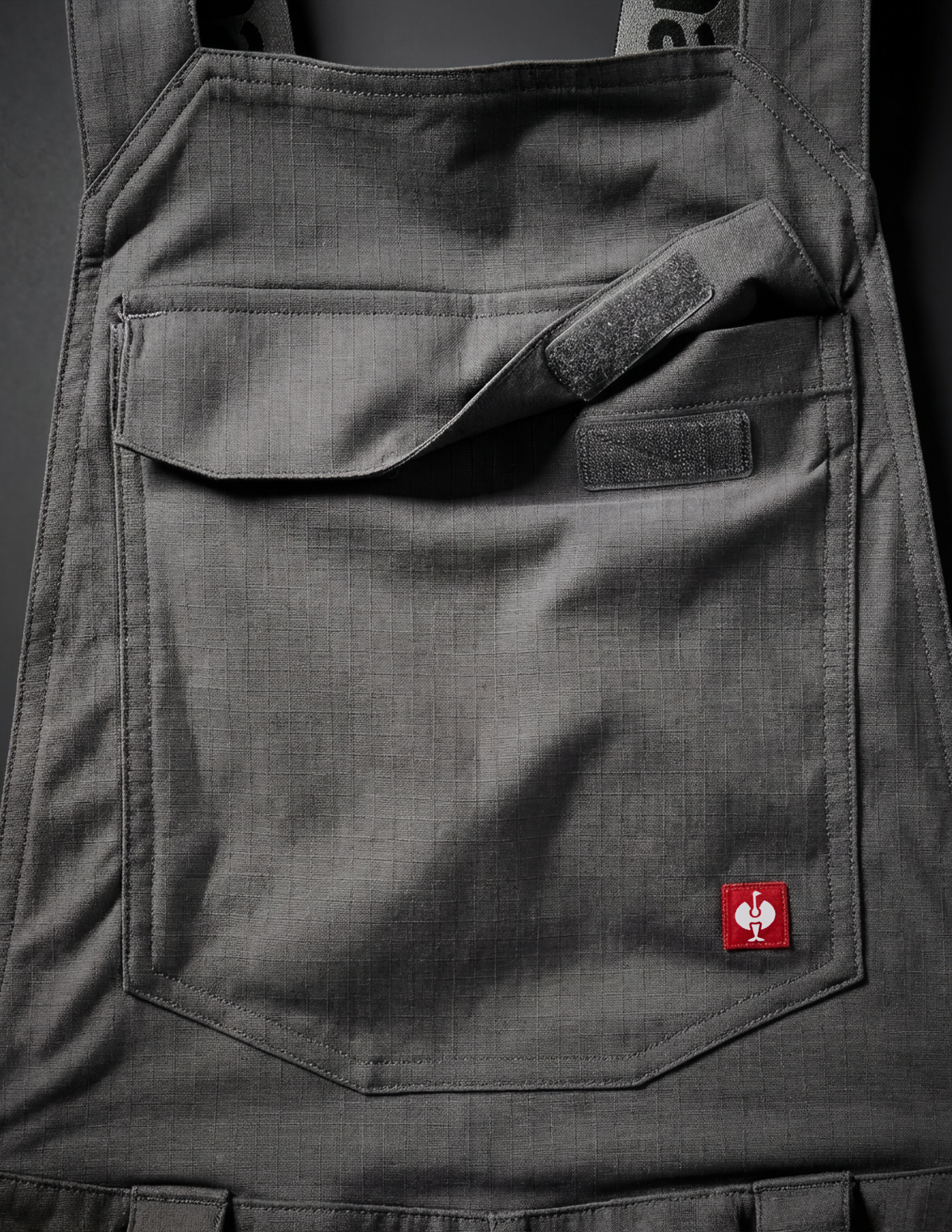 close-up of large pocket with flap and hook-and-loop fastener