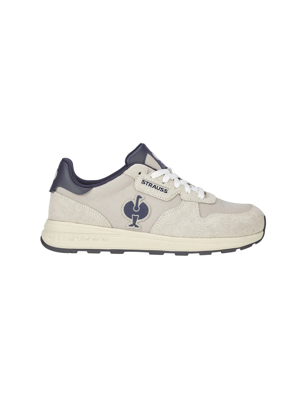 Beige sneaker with navy accents on a white background