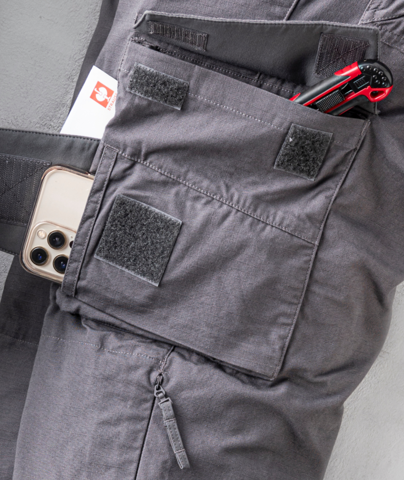 Close-up of STRAUSS e.s.e:pic Ripstop Cargo Work Pants showing cargo pockets and tool storage.