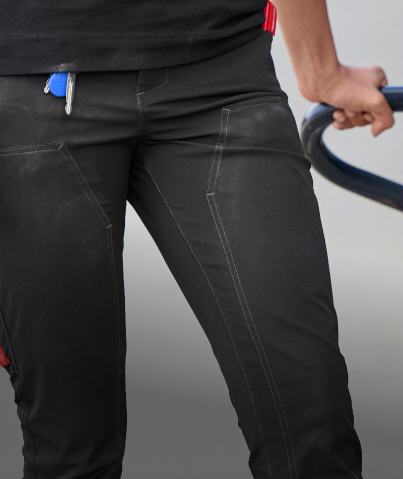 A woman wears STRAUSS Women's e.s.e:pic Leggings with work boots in a jobsite outfit.