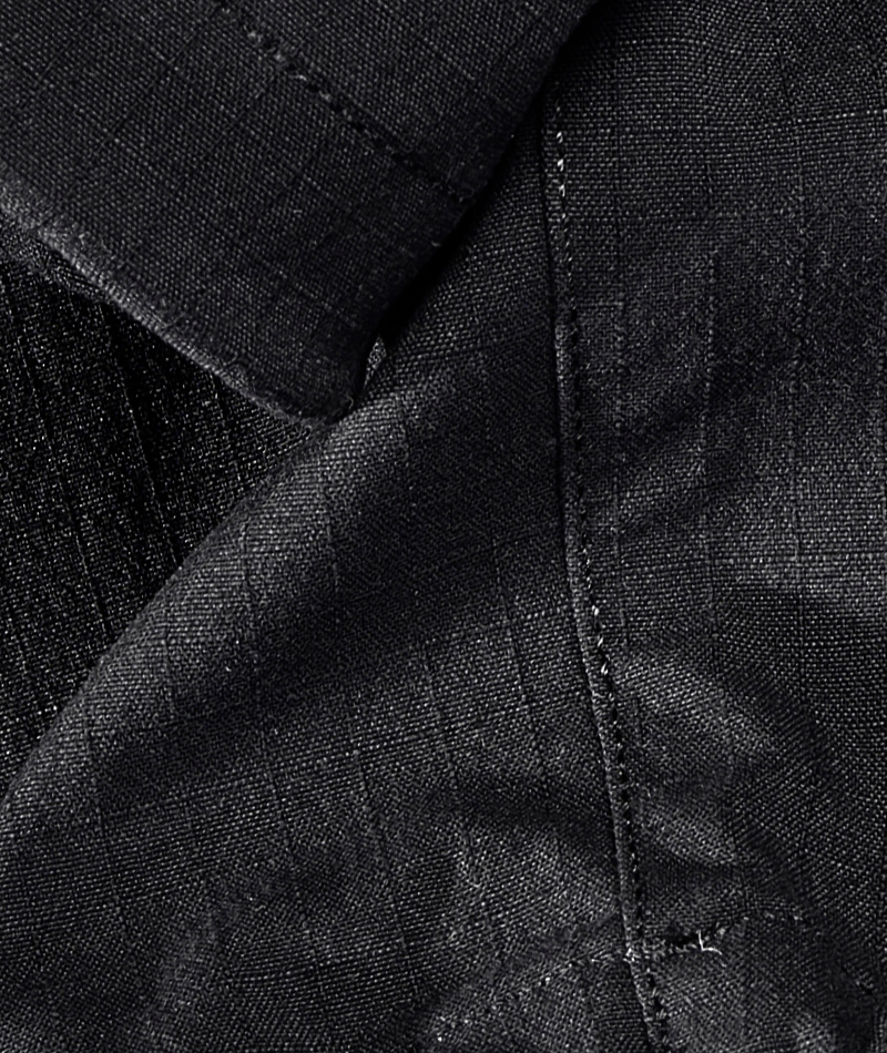 Close-up of STRAUSS e.s.taktik Stretch Ripstop Cargo Work Bib Overall showing reinforced fabric.