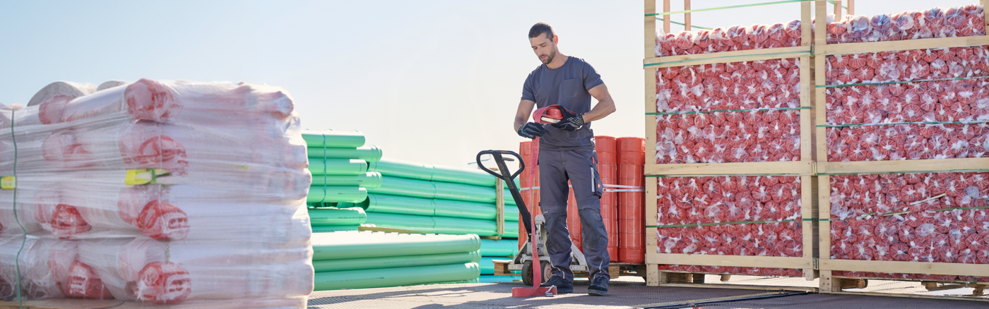 A man rolling up a safety rope